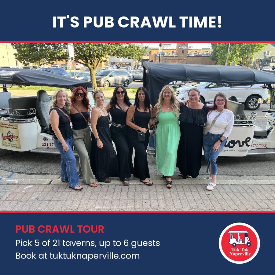 Real customers posing with two tuk tuks after a pub crawl